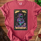 T-shirt with a gaming graphic of a hooded figure holding a controller, "XP", "Respawn & Regret".