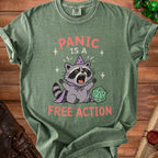 Green t-shirt with raccoon in wizard hat saying "Panic Is A Free Action".