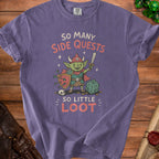 Purple t-shirt with a cartoon goblin holding a sword and shield, text "So Many Side Quests So Little Loot."