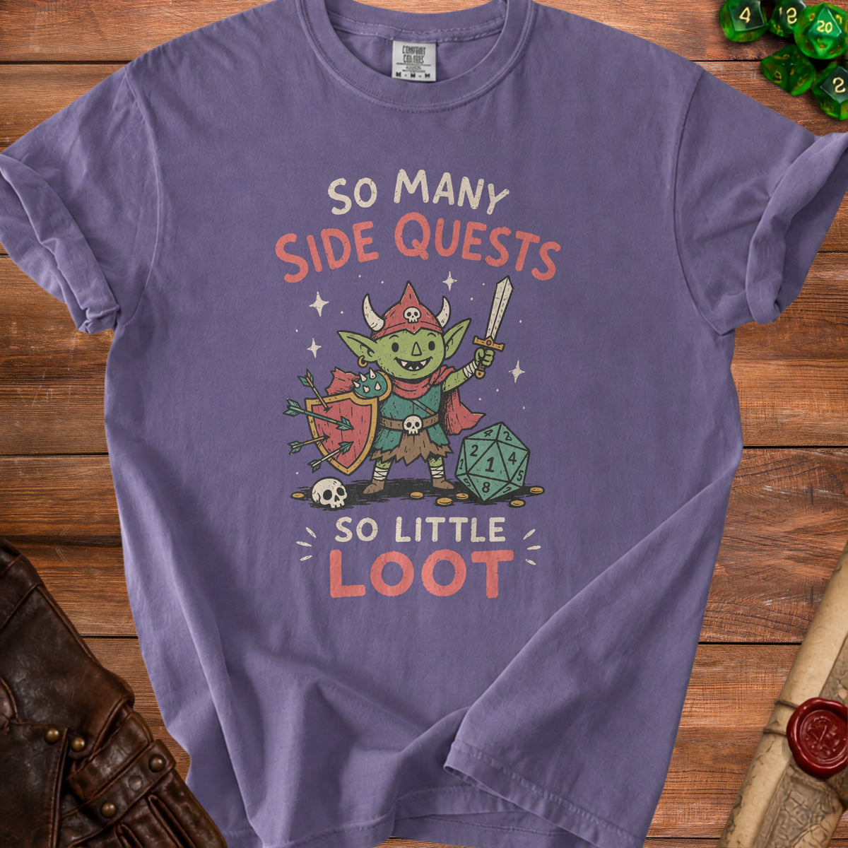 Purple t-shirt with a cartoon goblin holding a sword and shield, text "So Many Side Quests So Little Loot."