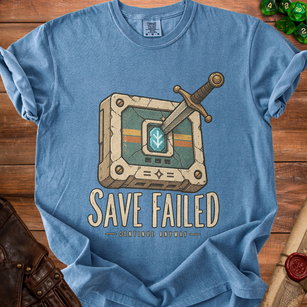 Blue t-shirt with "SAVE FAILED - CONTINUE ANYWAY" graphic of a sword in a cracked box.