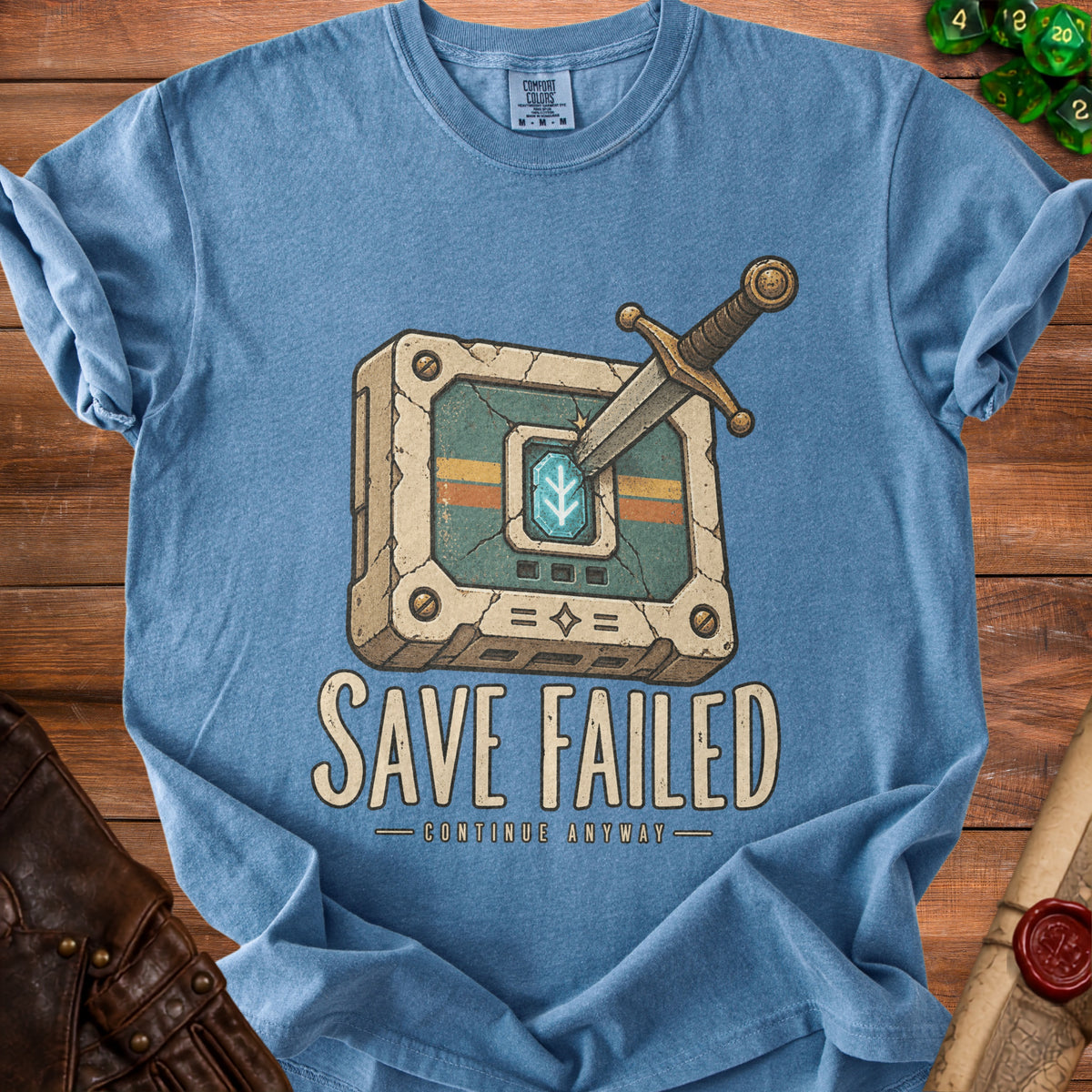Blue t-shirt with "SAVE FAILED - CONTINUE ANYWAY" graphic of a sword in a cracked box.