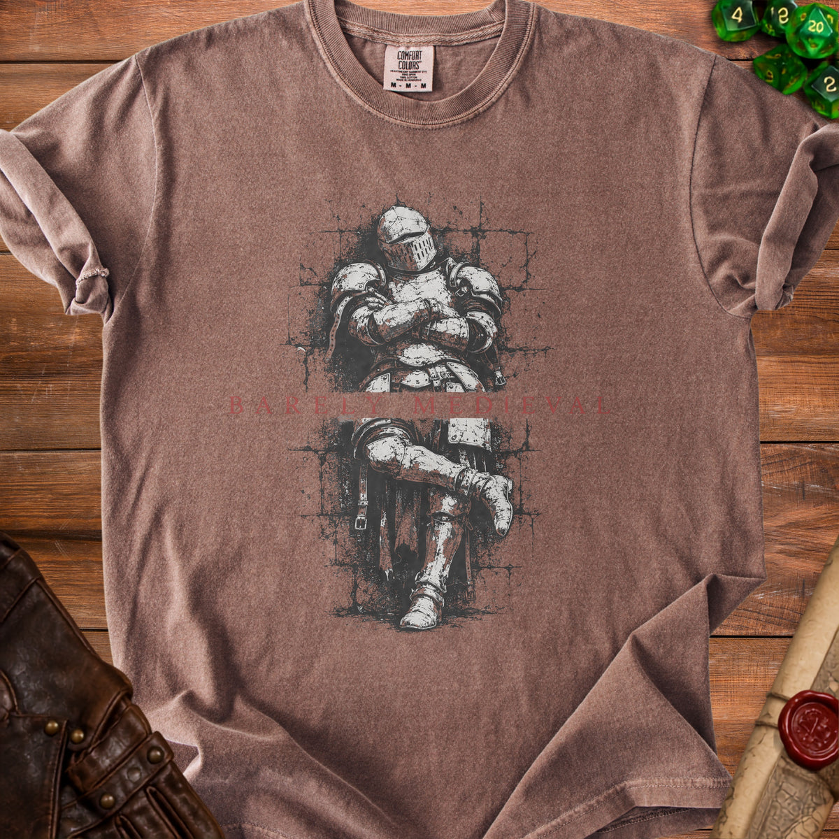 Brown t-shirt with a medieval knight graphic and "RELY MEDIEV" text.
