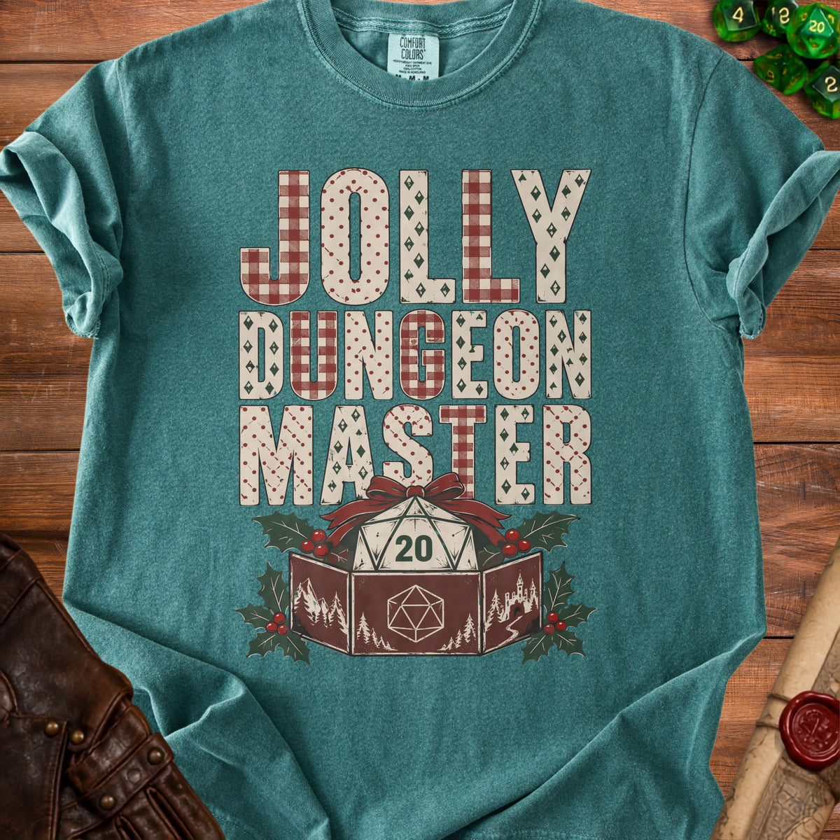 T-shirt with "Jolly Dungeon Master" text and a D20 die gift box design.