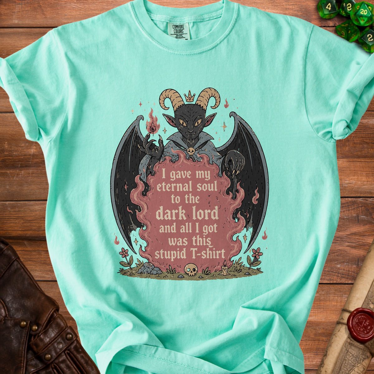Teal t-shirt with devil illustration and text "I gave my eternal soul to the dark lord and all I got was this stupid T-shirt".