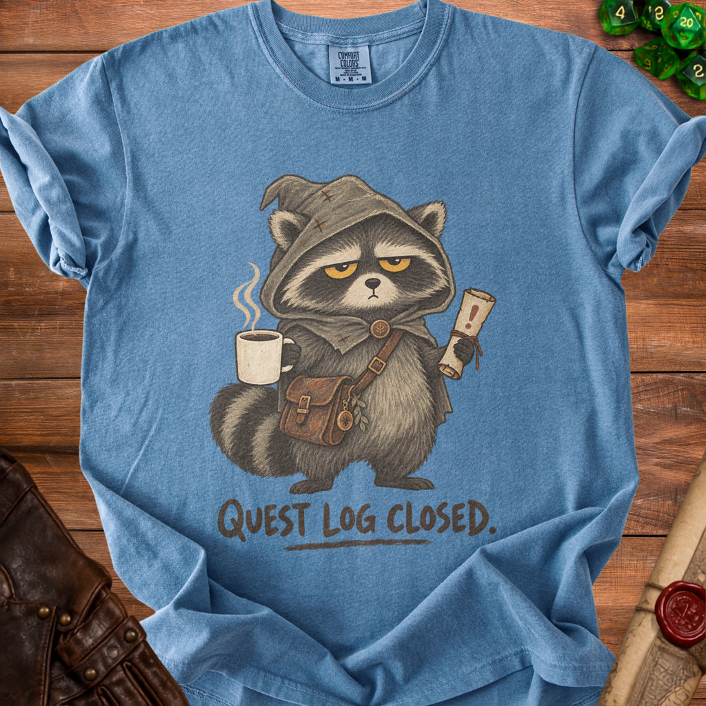 Blue t-shirt with a hooded raccoon holding a coffee and scroll, text reads "QUEST LOG CLOSED".