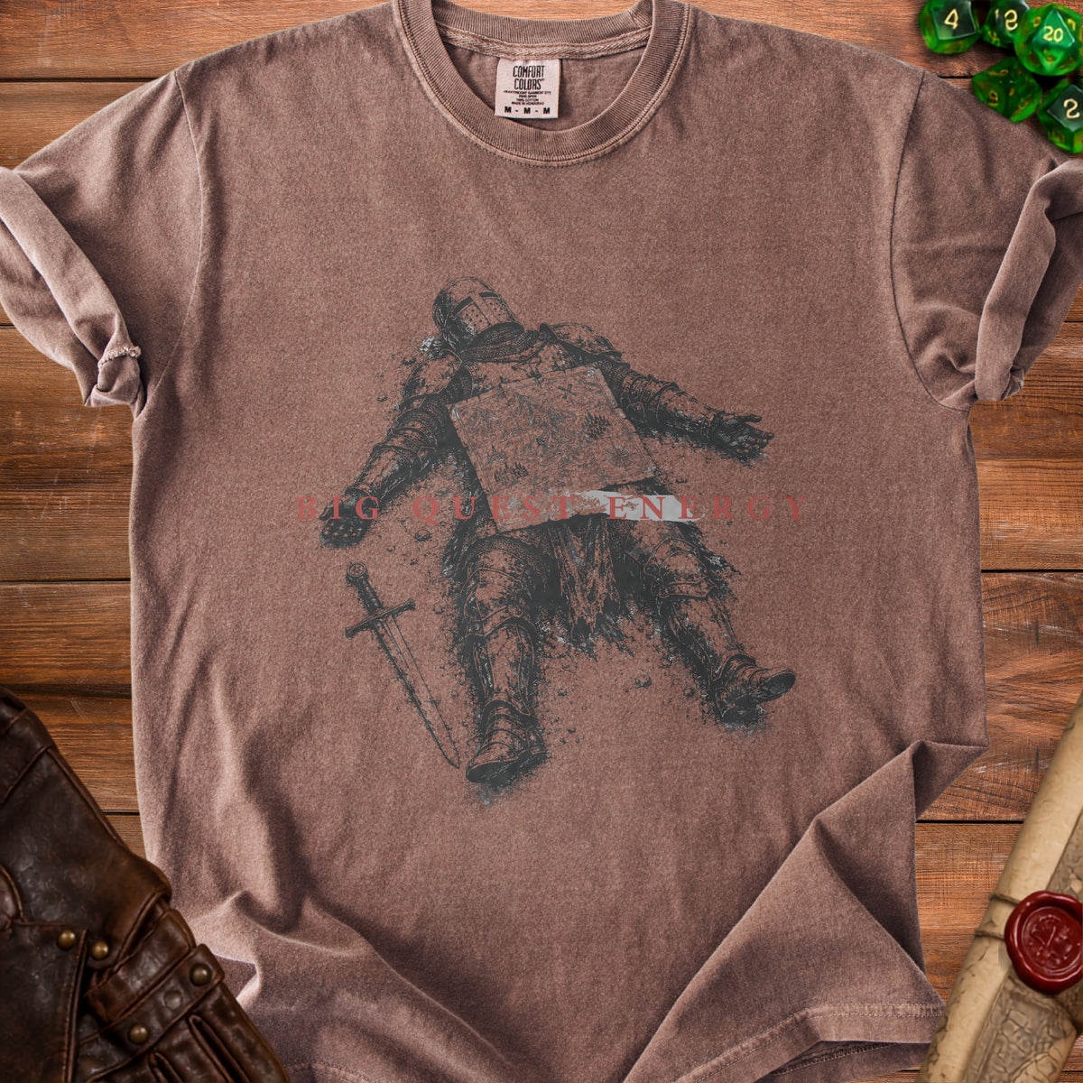Brown t-shirt with faded print of a fallen knight and map, "Quest for Energy" text.