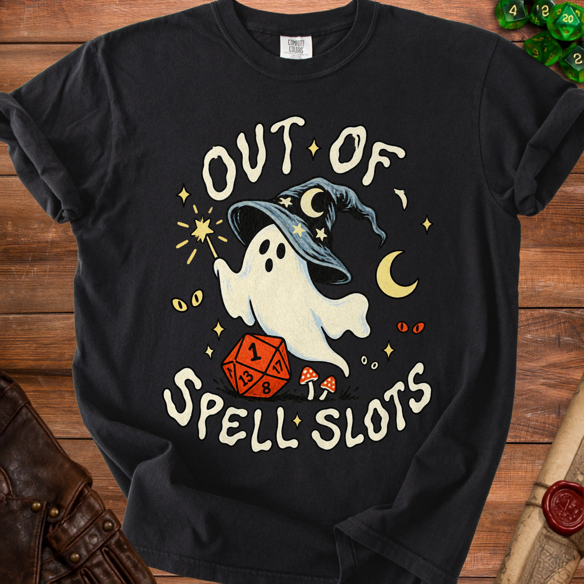 Black t-shirt with ghost in wizard hat and dice, saying "OUT OF SPELL SLOTS".