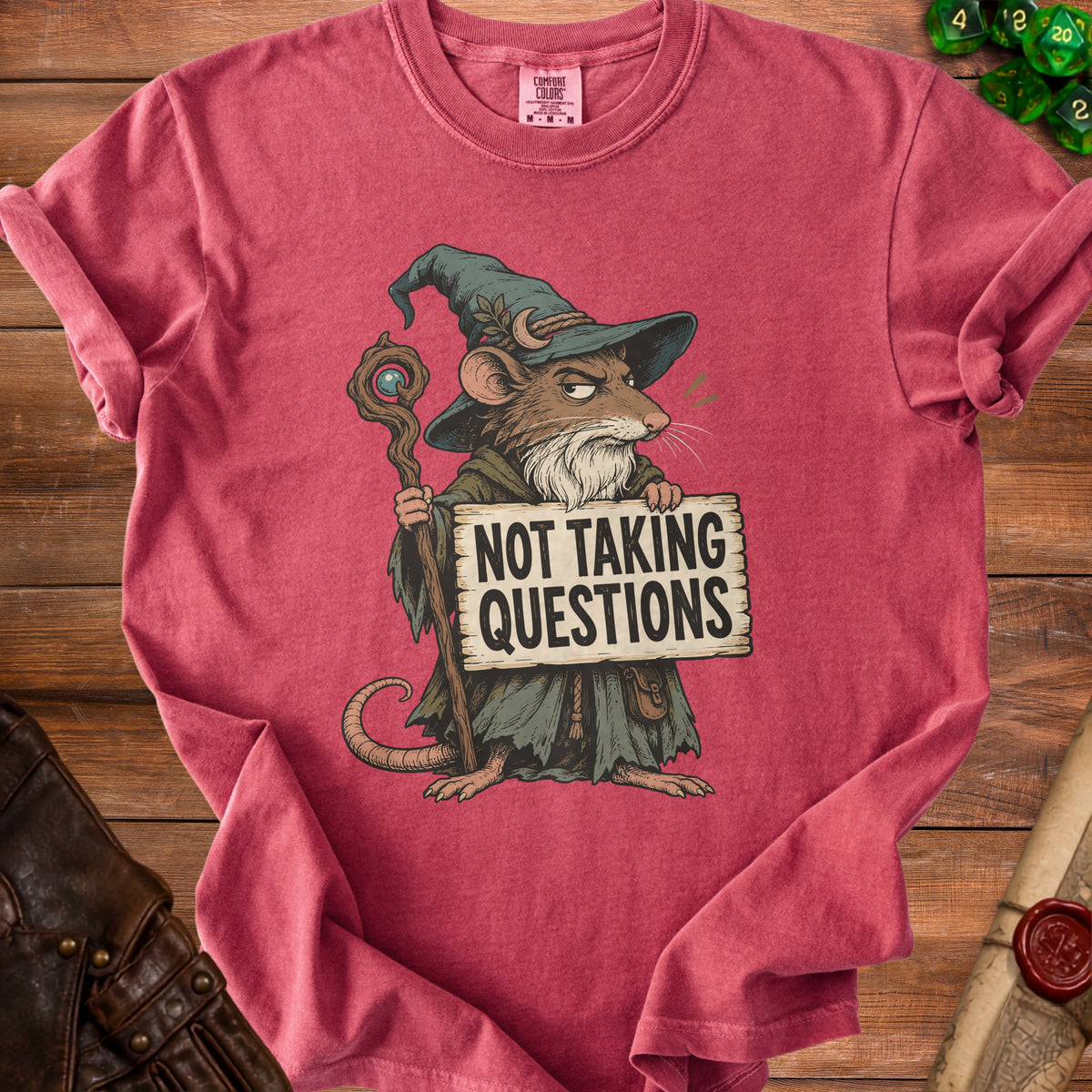 T-shirt with illustration of a wizard mouse holding a "Not Taking Questions" sign.