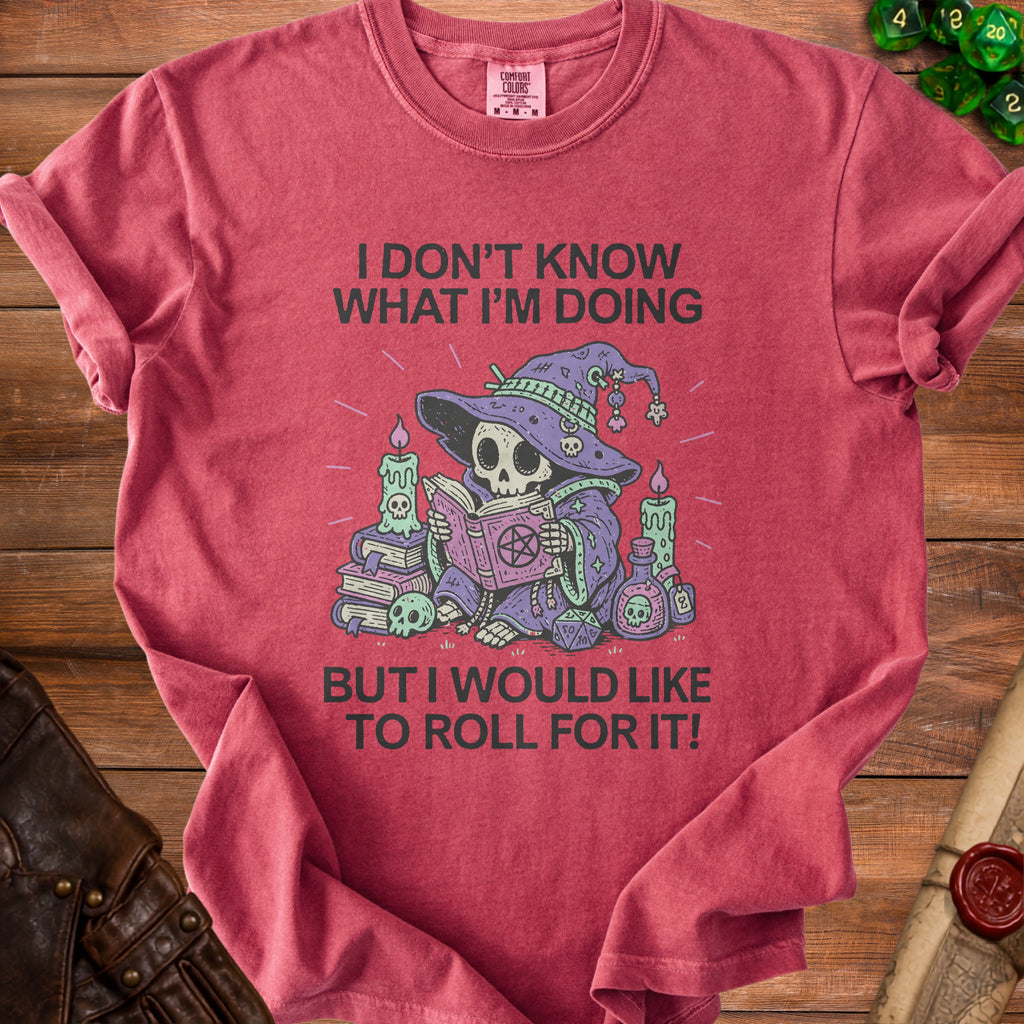 Red t-shirt with skeleton wizard graphic and text "I DON'T KNOW WHAT I'M DOING BUT I WOULD LIKE TO ROLL FOR IT!".