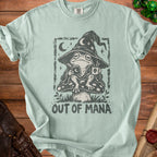 Pale green t-shirt with frog wizard reading and drinking coffee, saying "Out of Mana".