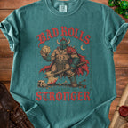 Green t-shirt with a warrior holding a die and axe; "Bad rolls only make me stronger" text.