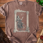 Brown t-shirt with demonic woman, scroll, gargoyle, and text "MY PATRON EXPECTS TOO MUCH".