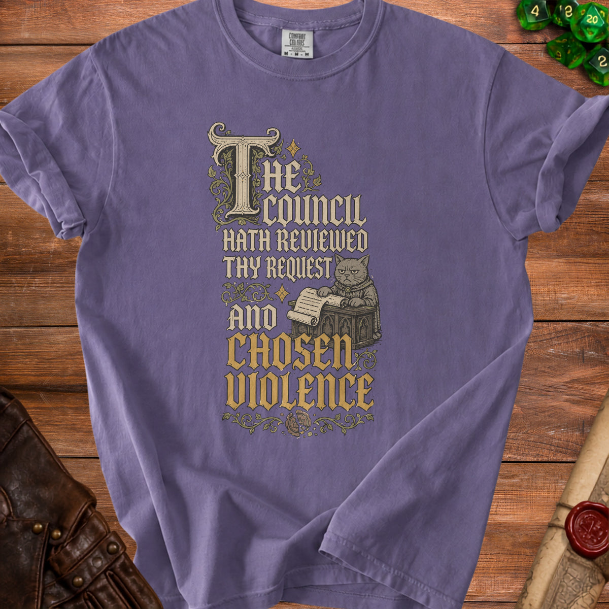Purple t-shirt with text "The council hath reviewed thy request and chosen violence."