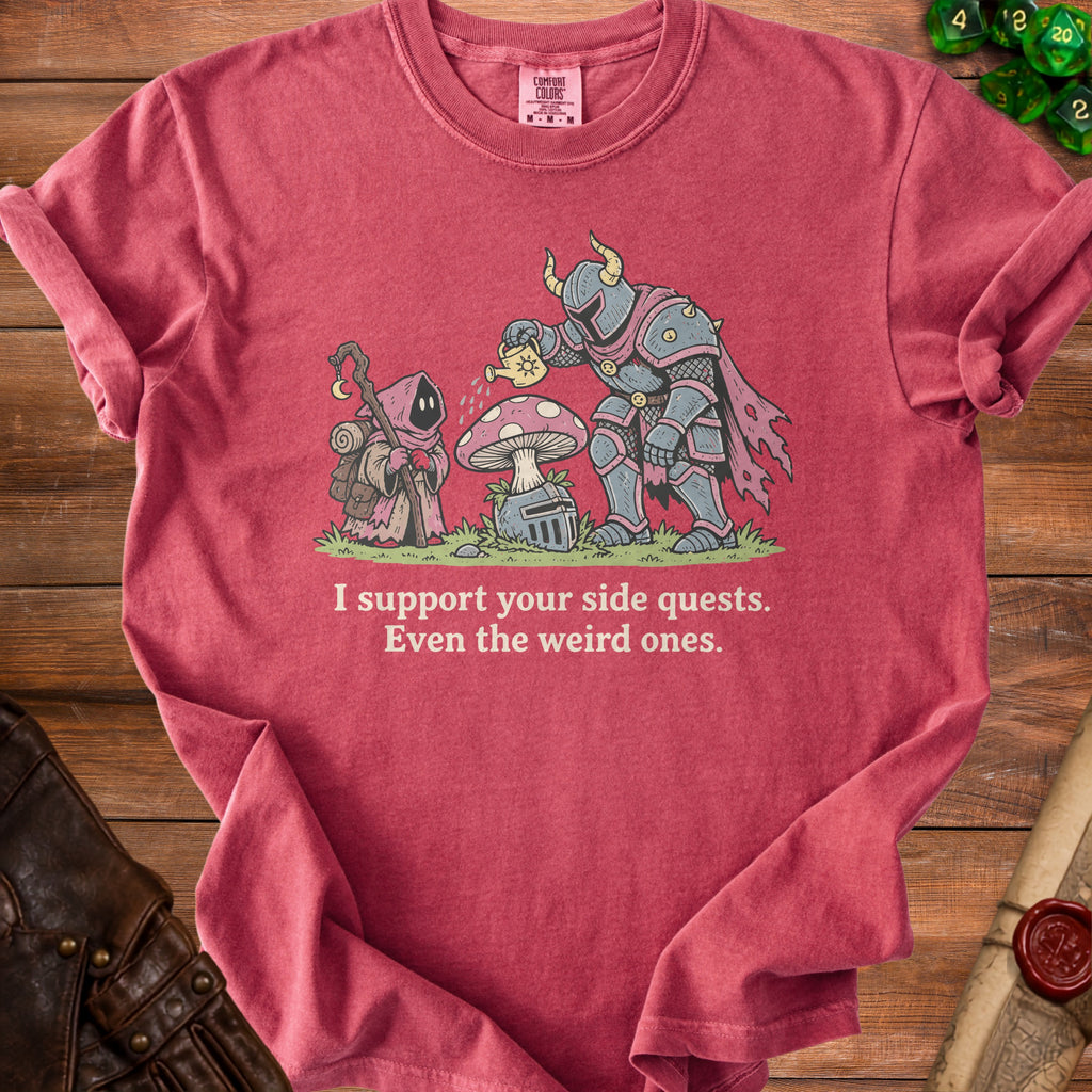 Red t-shirt with fantasy illustration of knight watering mushroom and text "I support your side quests."