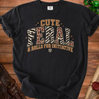 Black t-shirt with text "CUTE FERAL & ROLLS FOR INITIATIVE" and dice graphic.