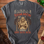 Dark gray t-shirt with graphic: "Be the ancestor they summon. When shit gets real."