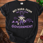 T-shirt with a cartoon goat, farm, and text "My Aura Farm Was Shut Down By The Government".