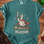 Goose wearing a cape and holding a sword with "HUZZAH" text.