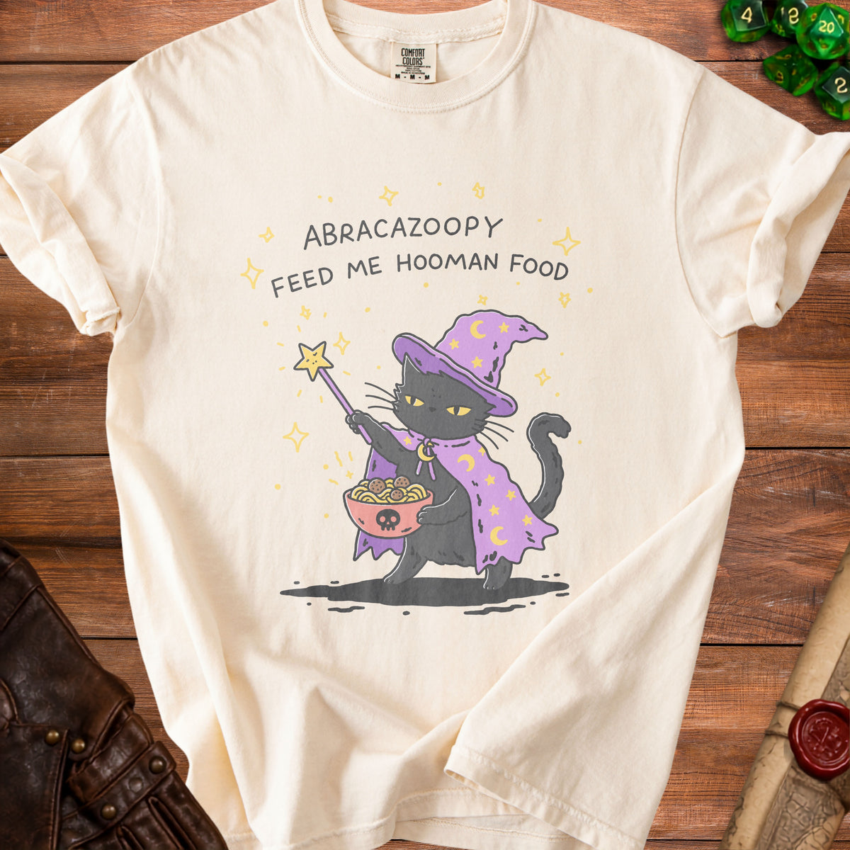 Black cat in wizard hat holding pasta, "Abracazoopy Feed Me Hooman Food" text.
