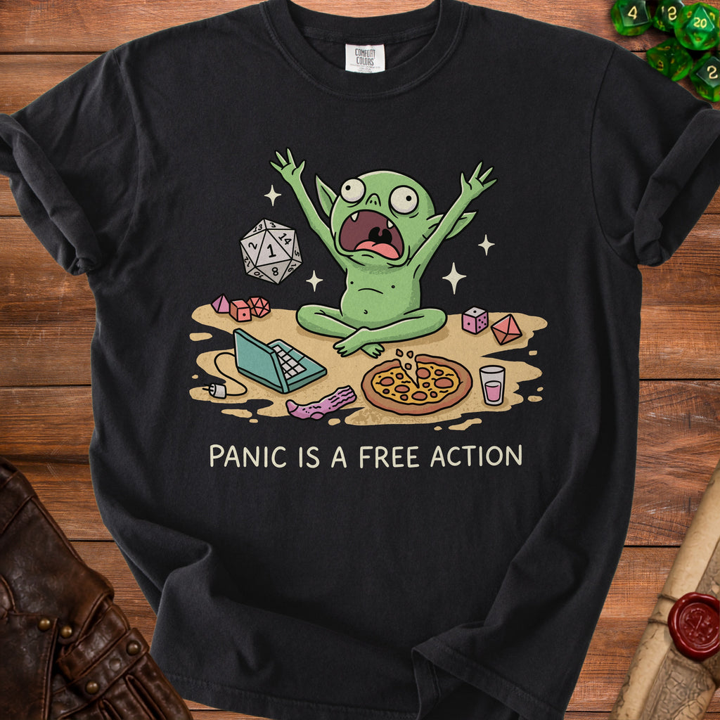 Green creature panics among dice, pizza, laptop, and sock with text "PANIC IS A FREE ACTION".
