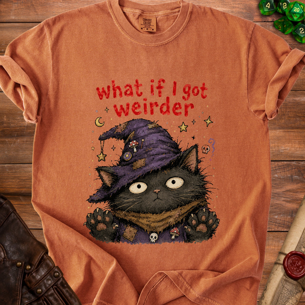 Orange t-shirt with a black cat wearing a wizard hat and the text "what if I got weirder".