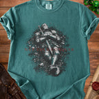 Teal t-shirt with knight artwork and "NOT THEN CONQUER" text.