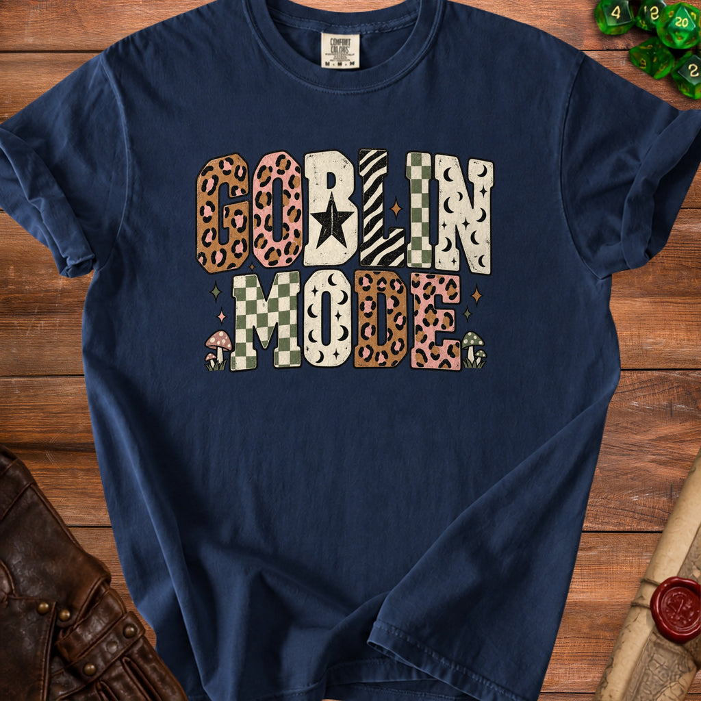 Navy t-shirt with "GOBLIN MODE" text featuring leopard print and checkered patterns.
