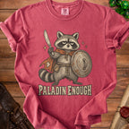 T-shirt with a raccoon knight holding a sword and shield, text "PALADIN ENOUGH".