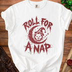 White t-shirt with maroon "Roll for a Nap" graphic featuring a D20 die.