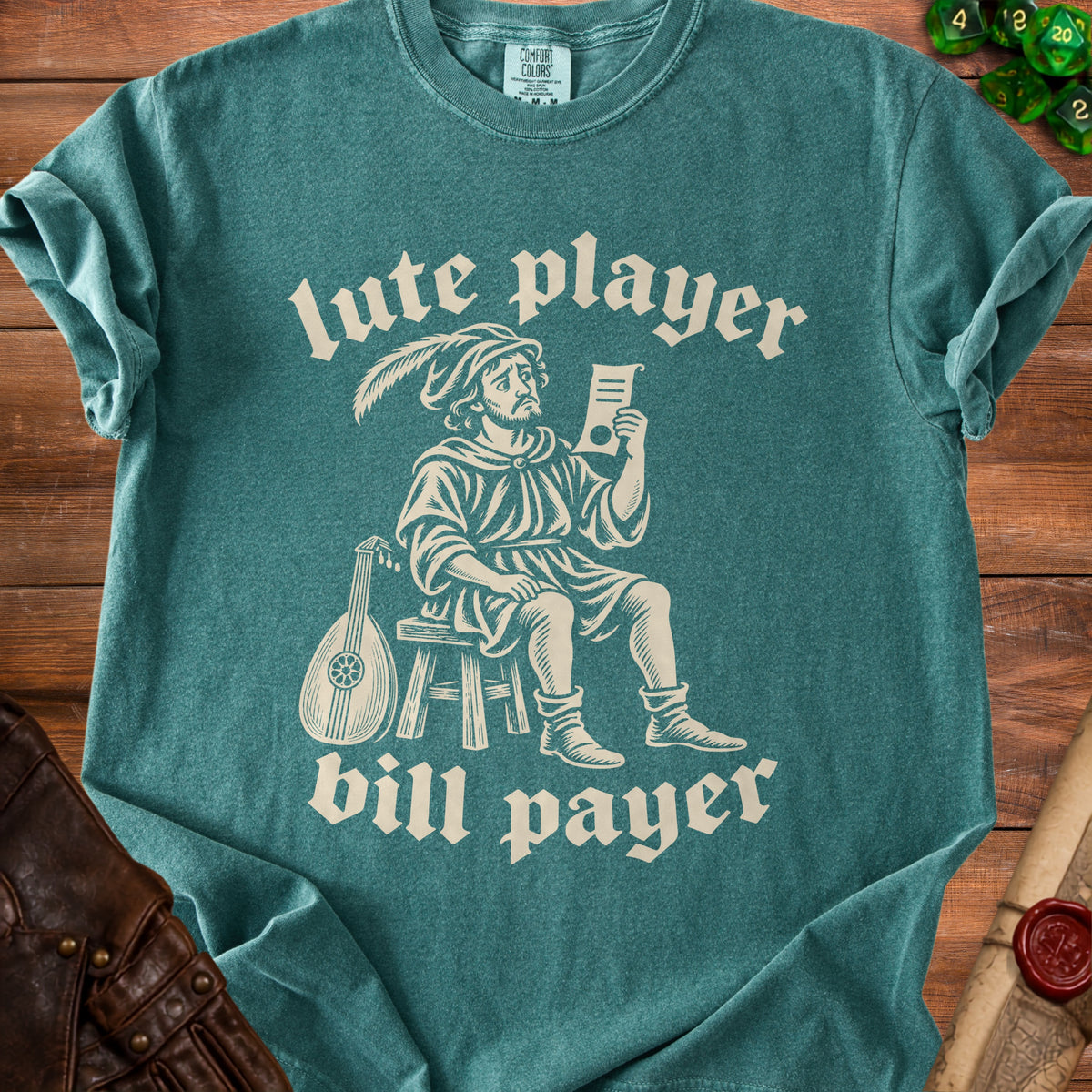 Green t-shirt with "lute player bill payer" text and graphic.