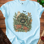 Light blue t-shirt with a D20 dice, ghost, pumpkins, and foliage graphic.