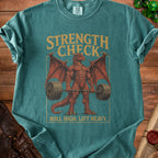 Teal t-shirt with a muscular dragon lifting a barbell, text reads "STRENGTH CHECK ROLL HIGH. LIFT HEAVY."