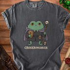 Gray t-shirt with a frog wizard graphic and the text "CROAKROMANCER".