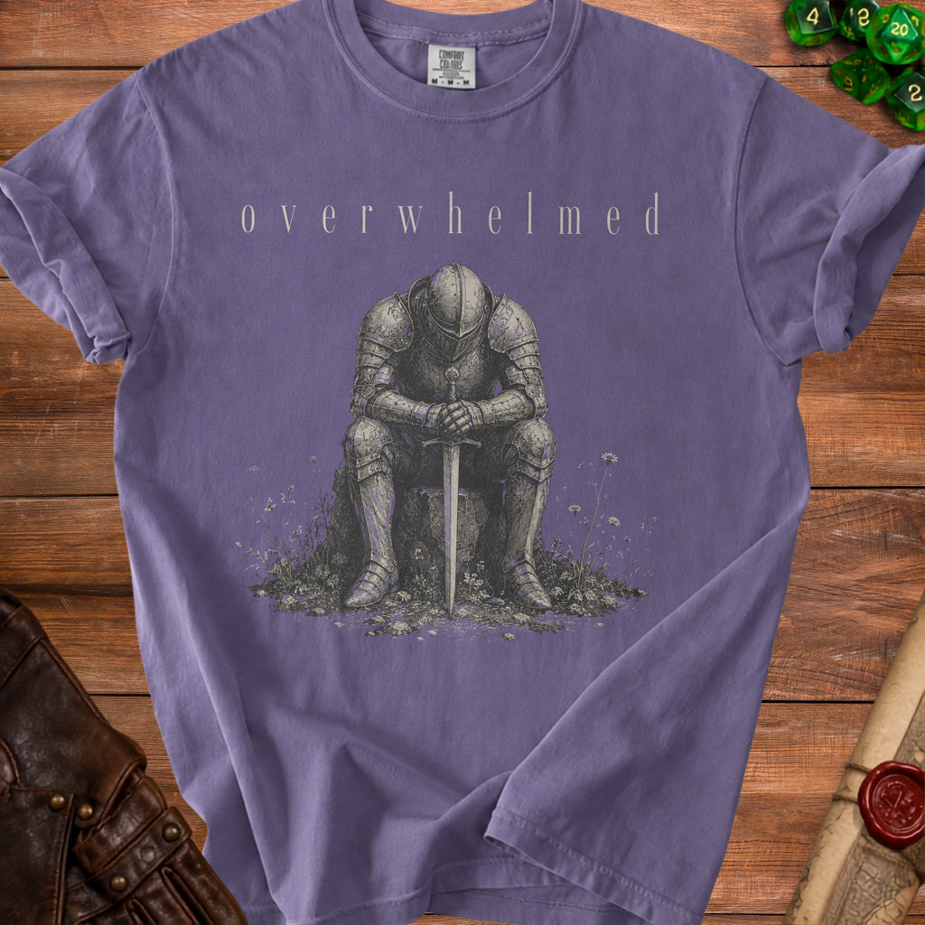 Purple t-shirt with knight sitting and sword, text "overwhelmed"