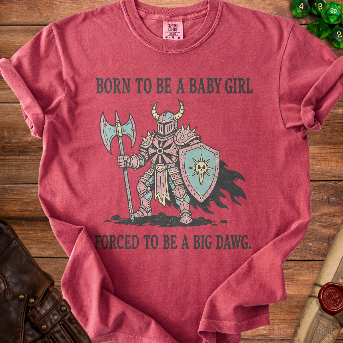 Crimson shirt with "Born to be a baby girl, forced to be a big dawg" text and knight graphic.