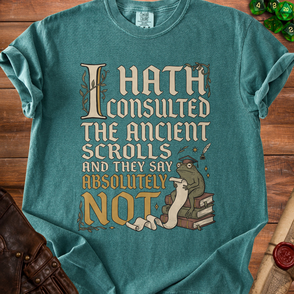 Teal t-shirt with text "I Hath Consulted The Ancient Scrolls and They Say Absolutely NOT" and a frog.