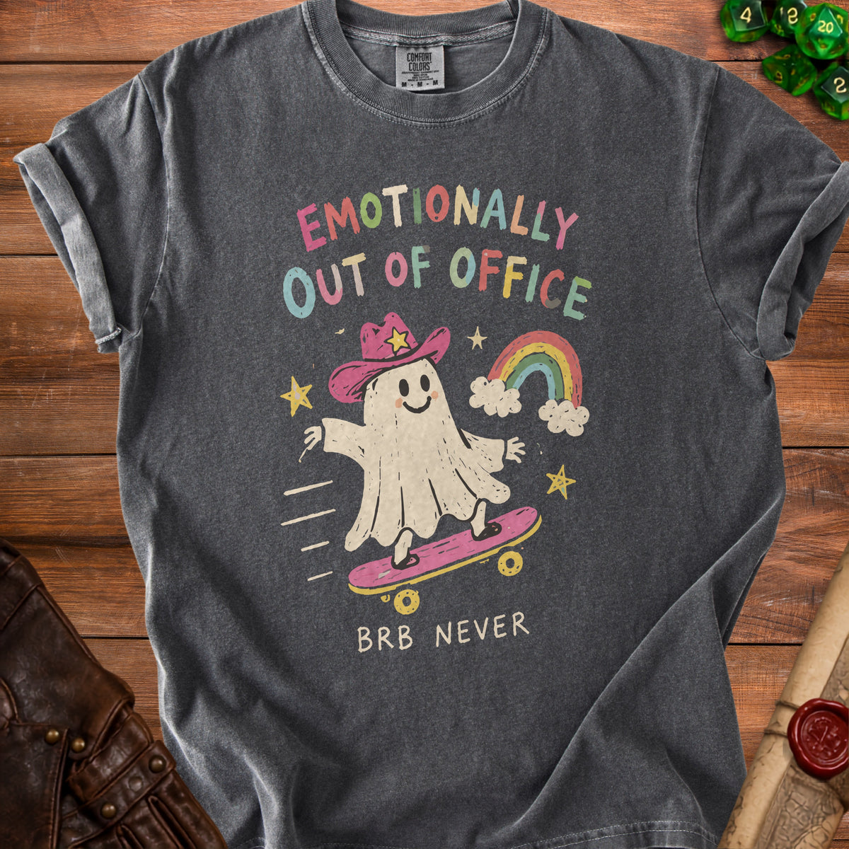 Gray t-shirt with a ghost character wearing a cowboy hat on a skateboard.