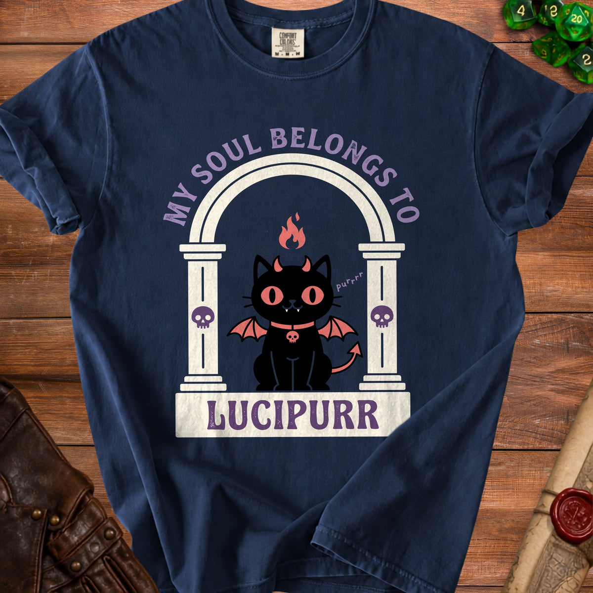 Navy t-shirt with a graphic of a devil cat with wings, horns, and a tail. Text reads "MY SOUL BELONGS TO LUCIPURR".