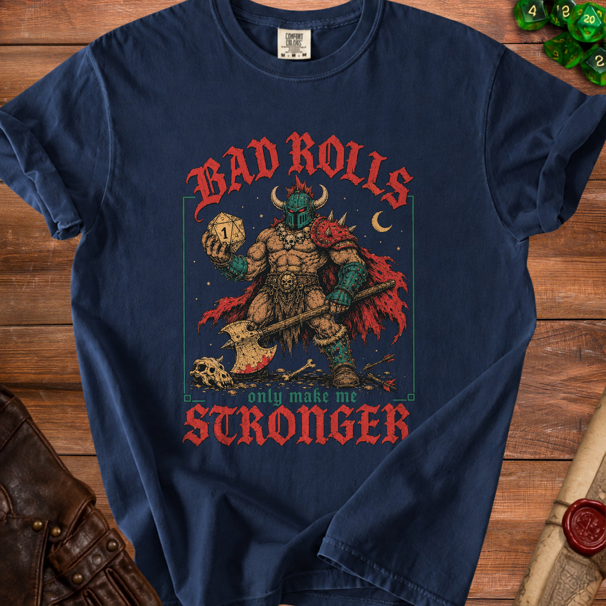 Navy t-shirt with barbarian art saying "Bad rolls only make me stronger".