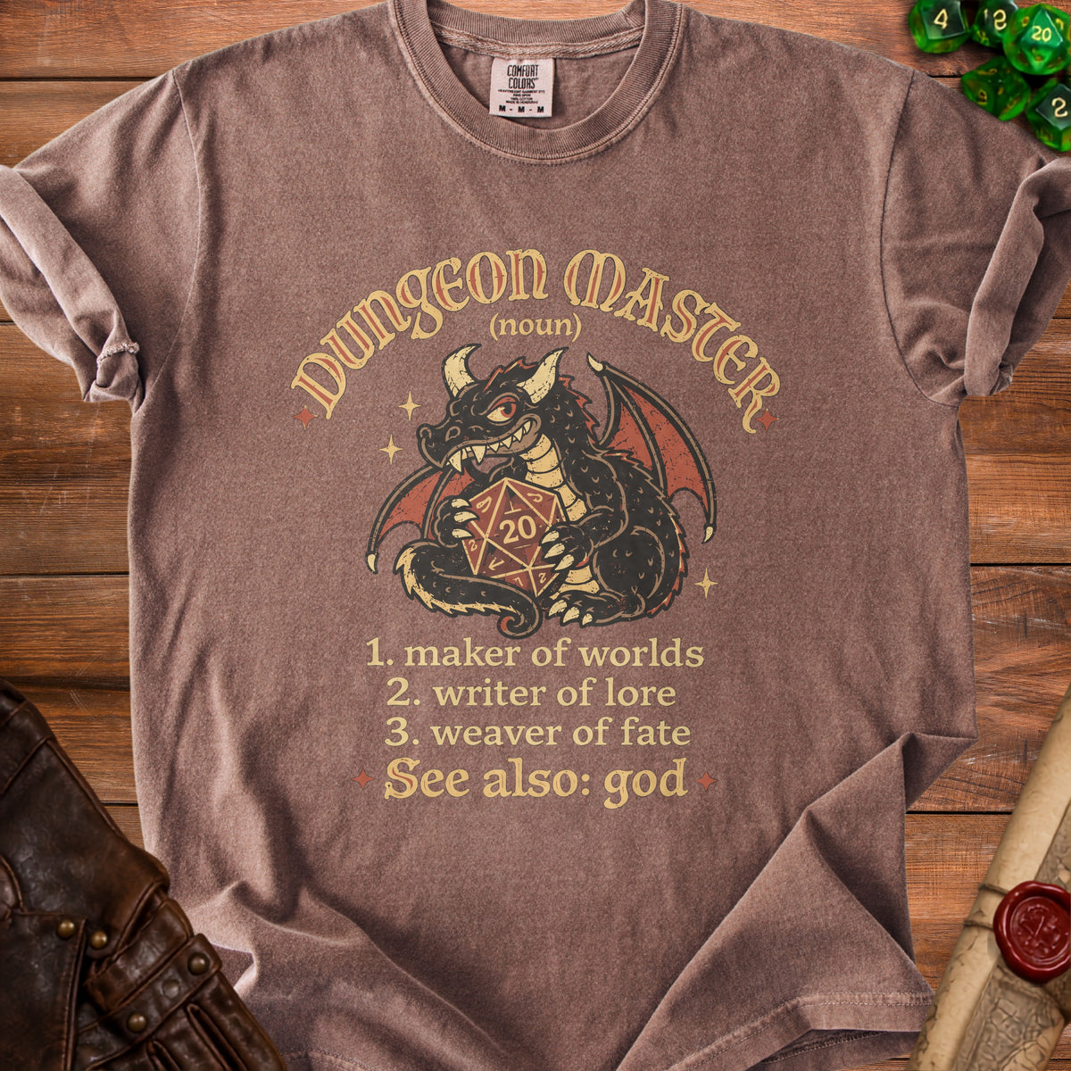 Brown t-shirt with a dragon holding a twenty-sided die and "Dungeon Master" text.