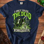 Navy t-shirt with "I Only Raise The Dead Not Expectations" graphic.
