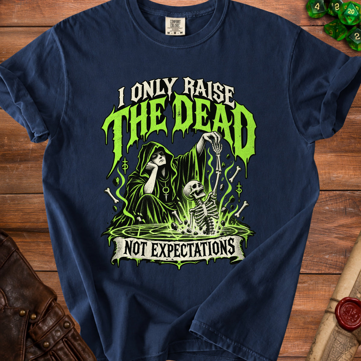 Navy t-shirt with "I Only Raise The Dead Not Expectations" graphic.