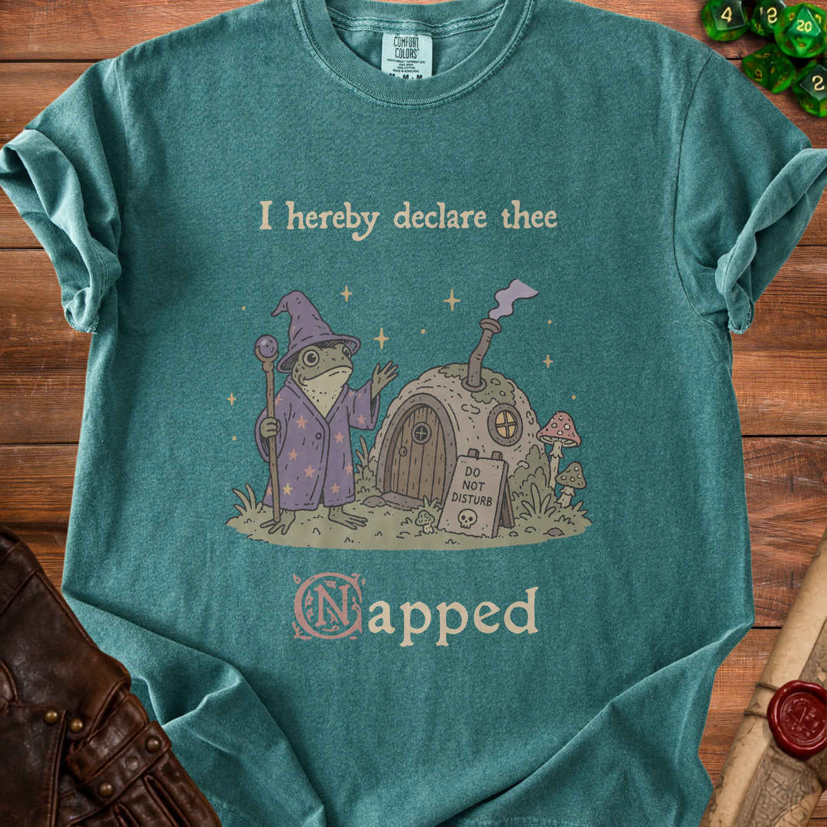 Teal t-shirt with frog wizard graphic and text "I hereby declare thee Napped".