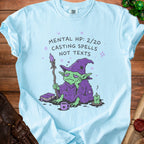 Light blue t-shirt with "Mental HP: 2/20 Casting Spells Not Texts" and a goblin.