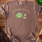 Brown t-shirt with a frog wearing a wizard hat and text "I'M NOT NETWORKING. I'M NECROMANCING."