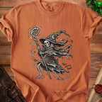 Skeleton wizard graphic on an orange t-shirt with text "This seems bad."