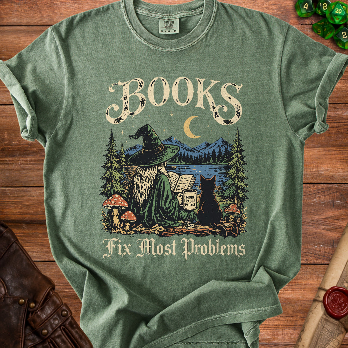 Green t-shirt with a witch, black cat, and text: "BOOKS Fix Most Problems".