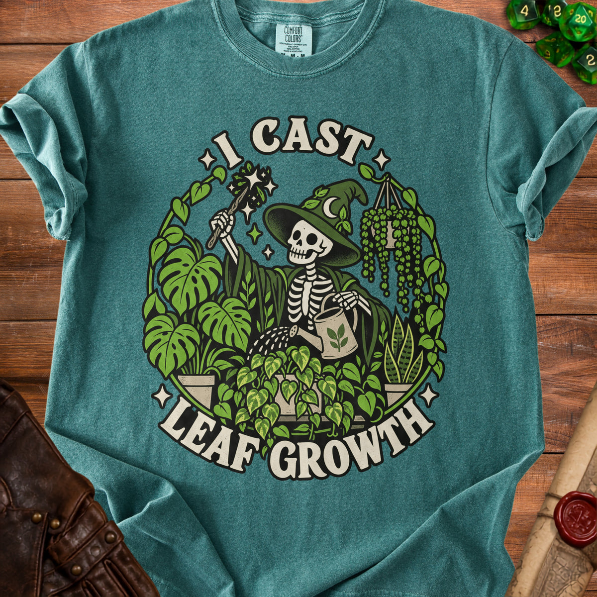 Skeleton wizard watering plants with text "I CAST LEAF GROWTH"