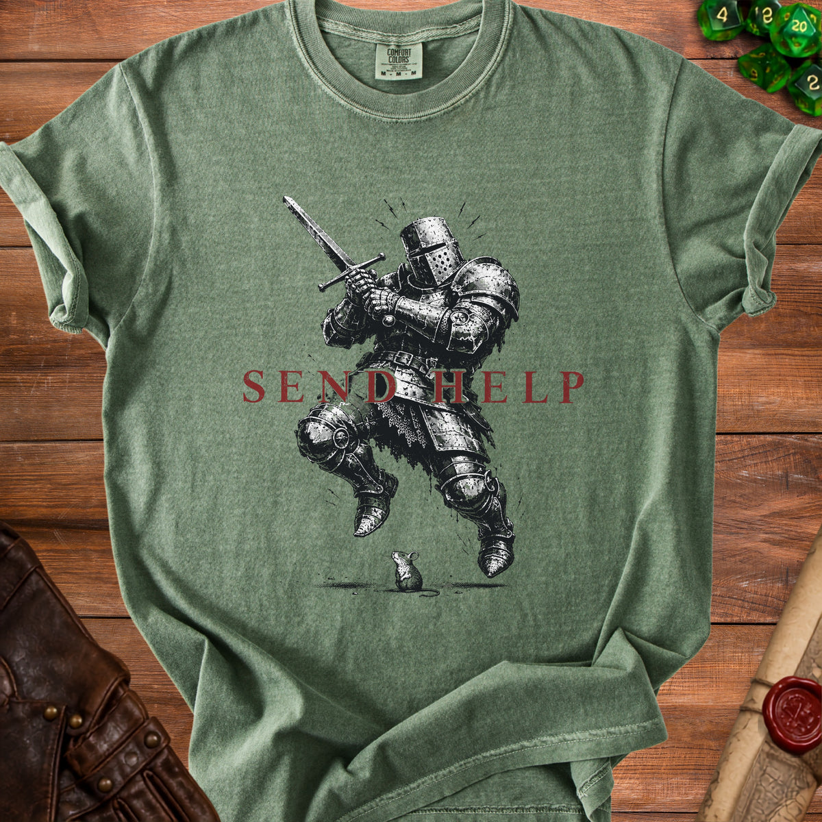 Green t-shirt with a black and white graphic of a knight and the words "SEND HELP".